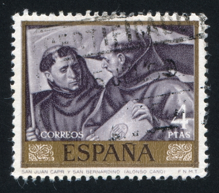 SPAIN - CIRCA 1969: stamp printed by Spain, shows Saint Juan Capistrano and Bernardino by Alonso Cano, circa 1969のeditorial素材