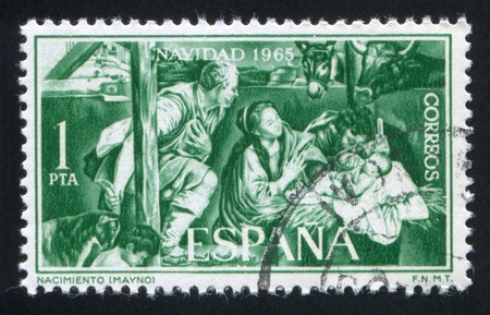 SPAIN - CIRCA 1965: stamp printed by Spain, shows Nativity by Mayno, circa 1965のeditorial素材