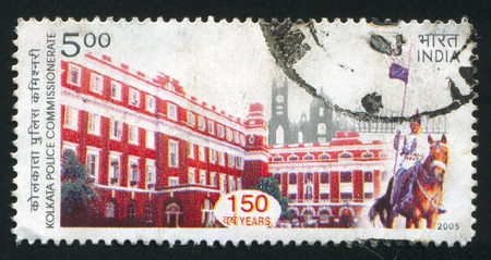 INDIA - CIRCA 2005: stamp printed by India, shows Calcutta Police Commissionerate, man on a horse, circa 2005のeditorial素材