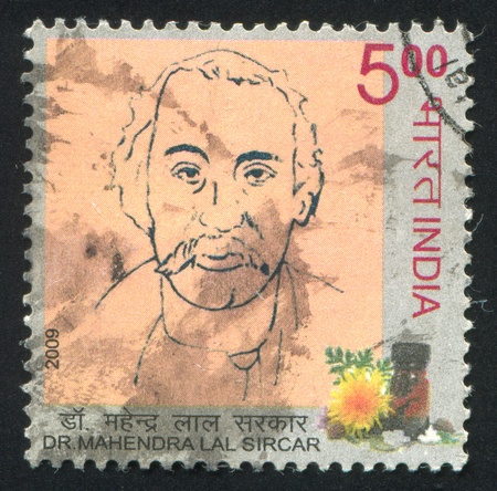INDIA - CIRCA 2009: stamp printed by India, shows portrait of Dr. Mahendra Lal Sircar, flower, circa 2009のeditorial素材