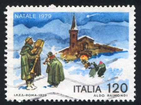 ITALY - CIRCA 1979: stamp printed by Italy, shows Minstrels and church, circa 1979のeditorial素材