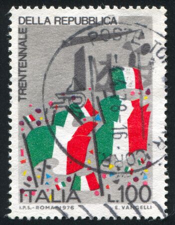 ITALY - CIRCA 1976: stamp printed by Italy, shows Italian flags, circa 1976のeditorial素材