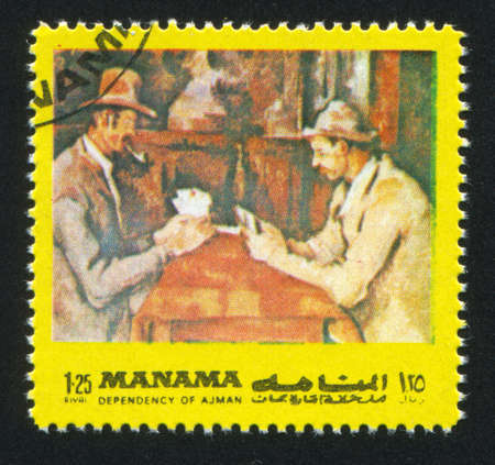 MANAMA - CIRCA 1972: stamp printed by Manama, shows Men playing cards, circa 1972のeditorial素材