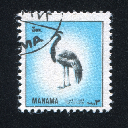 MANAMA - CIRCA 1972: stamp printed by Manama, shows Demoiselle Crane, circa 1972のeditorial素材