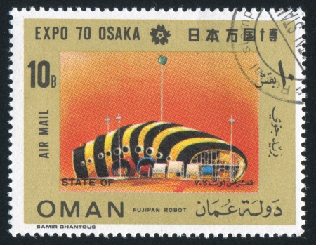 OMAN - CIRCA 1970: stamp printed by Oman, shows Fujipan Robot, circa 1970のeditorial素材