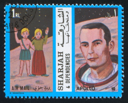 SHARJAH AND DEPENDENCIES - CIRCA 1972: stamp printed by Sharjah and Dependencies, shows Gemini and Apollo 10, circa 1972のeditorial素材