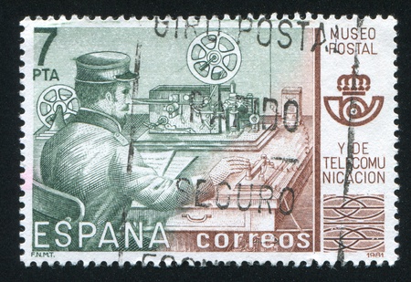 SPAIN - CIRCA 1981: stamp printed by Spain, shows Telegrapher, Postal
Museum, Madrid, circa 1981のeditorial素材