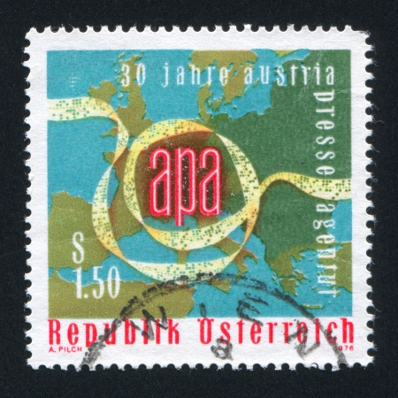 AUSTRIA - CIRCA 1976: stamp printed by Austria, shows Punched Tape, Map of Europe, circa 1976のeditorial素材