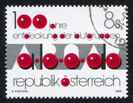 AUSTRIA - CIRCA 2000: stamp printed by Austria, shows Discovery of Human Blood Types, circa 2000のeditorial素材