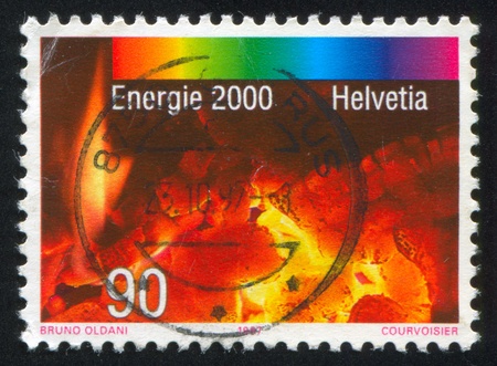 SWITZERLAND - CIRCA 1997: stamp printed by Switzerland, shows Fire, circa 1997のeditorial素材