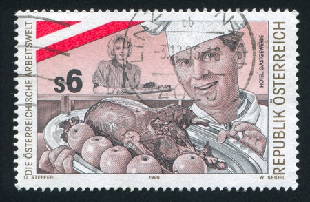 AUSTRIA - CIRCA 1996: stamp printed by Austria, shows cook, dish, apples, chicken, circa 1996のeditorial素材