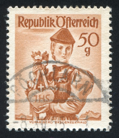 AUSTRIA - CIRCA 1949: stamp printed by Austria, shows Woman in Austian costumes, circa 1949のeditorial素材