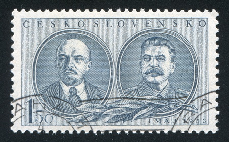CZECHOSLOVAKIA - CIRCA 1953: stamp printed by Czechoslovakia, shows Lenin and Stalin, circa 1953のeditorial素材