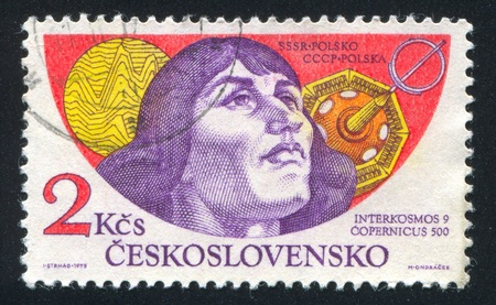 CZECHOSLOVAKIA - CIRCA 1975: stamp printed by Czechoslovakia, shows Copernicus, radio map of the sun and satellite, circa 1975のeditorial素材