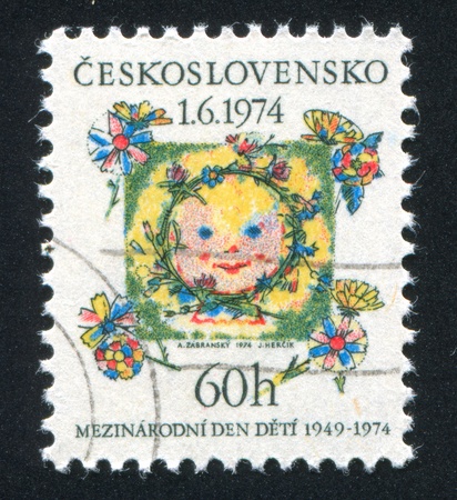 CZECHOSLOVAKIA - CIRCA 1974: stamp printed by Czechoslovakia, shows Child, circa 1974のeditorial素材