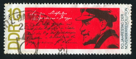 GERMANY - CIRCA 1968: stamp printed by Germany, shows Lenin and Letter to Spartacists, circa 1968のeditorial素材