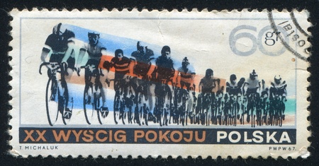 POLAND - CIRCA 1967: stamp printed by Poland, shows Bicyclists, circa 1967のeditorial素材