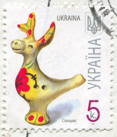 UKRAINE - CIRCA 2010: stamp printed by Ukraine, shows Tin whistle, circa 2010のeditorial素材