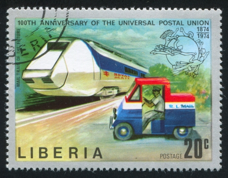 LIBERIA - CIRCA 1974: stamp printed by Liberia, shows Futuristic mail train and mail truck, circa 1974のeditorial素材