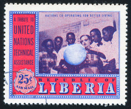 LIBERIA - CIRCA 1954: stamp printed by Liberia, shows Geography class, circa 1954のeditorial素材