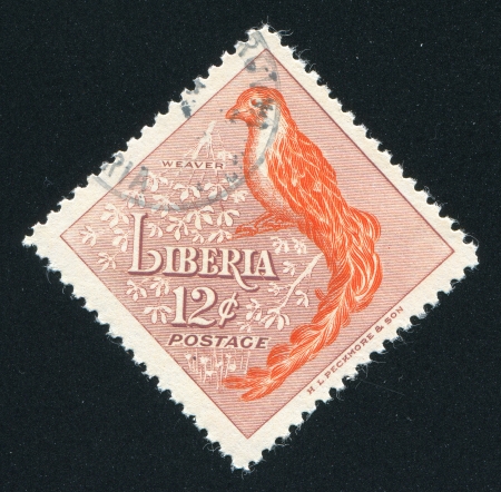 LIBERIA - CIRCA 1953: stamp printed by Liberia, shows Weaver, circa 1953のeditorial素材