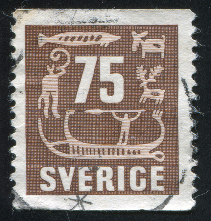 SWEDEN - CIRCA 1954: stamp printed by Sweden, shows Rock Carvings, circa 1954のeditorial素材