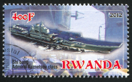 RWANDA - CIRCA 2012: stamp printed by Rwanda, shows aircraft carrier, circa 2012のeditorial素材