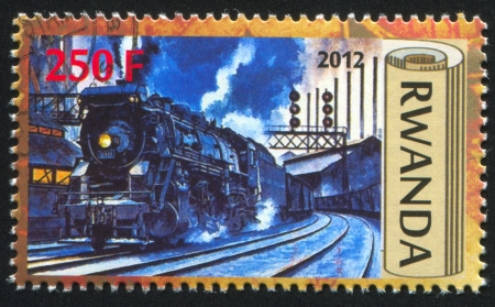 RWANDA - CIRCA 2012: stamp printed by Rwanda, shows Train, circa 2012のeditorial素材