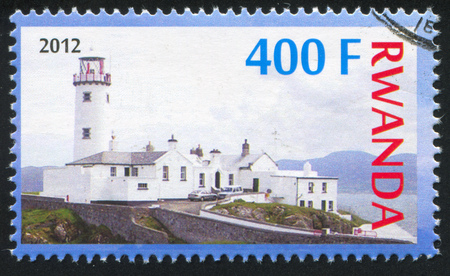 RWANDA - CIRCA 2012: stamp printed by Rwanda, shows Lighthouse, circa 2012のeditorial素材
