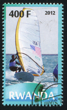 RWANDA - CIRCA 2012: stamp printed by Rwanda, shows Sailing regatta, circa 2012のeditorial素材