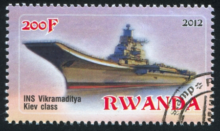 RWANDA - CIRCA 2012: stamp printed by Rwanda, shows aircraft carrier, circa 2012のeditorial素材