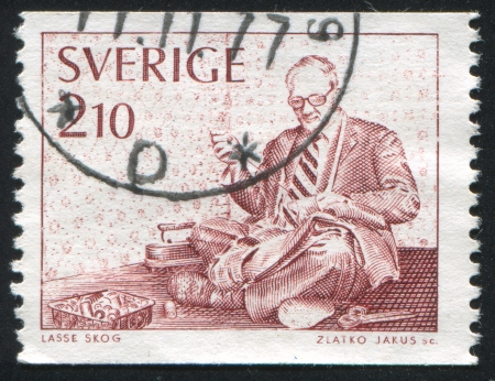 SWEDEN - CIRCA 1977: stamp printed by Sweden, shows Tailor, circa 1977のeditorial素材