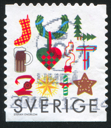 SWEDEN - CIRCA 2008: stamp printed by Sweden, shows Christmas toys, circa 2008のeditorial素材