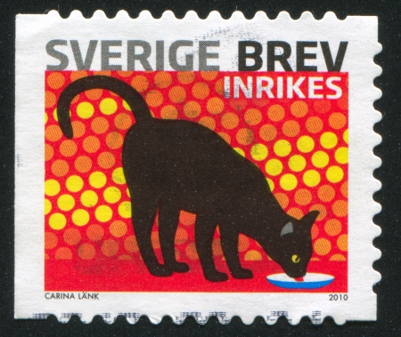 SWEDEN - CIRCA 2010: stamp printed by Sweden, shows Cat, circa 2010のeditorial素材