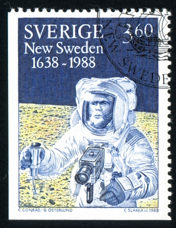 SWEDEN - CIRCA 1988: stamp printed by Sweden, shows American astronaut with Swedish Hasselblad camera on the Moon, circa 1988のeditorial素材