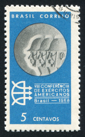 BRAZIL - CIRCA 1968: stamp printed by Brazil, shows  Soldiers Heads on Medal, circa 1968のeditorial素材