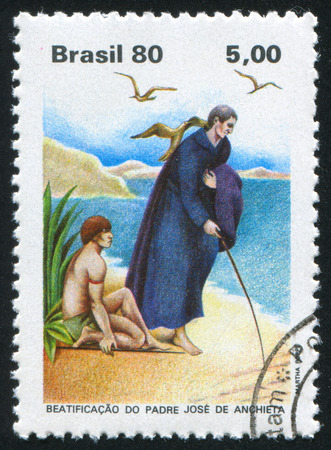 BRAZIL - CIRCA 1980: stamp printed by Brazil, shows  Father Anchieta Writing Virgin Mary, Mother of God on Sand of Iperoig Beach, circa 1980のeditorial素材