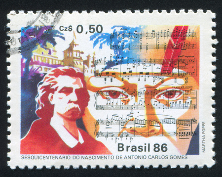 BRAZIL - CIRCA 1986: stamp printed by Brazil, shows  Score from Opera Il Guarani and Antonio Carlos Gomes Composer, circa 1986のeditorial素材