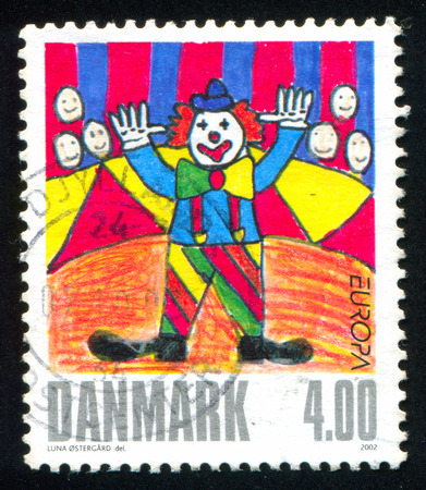 DENMARK - CIRCA 2002: stamp printed by Denmark, shows Clown by Luna Ostergard, circa 2002のeditorial素材