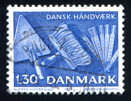 DENMARK - CIRCA 1977: stamp printed by Denmark, shows Trowel, ceiling brush and folding ruler, circa 1977のeditorial素材