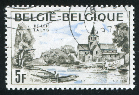 RUSSIA KALININGRAD, 20 OCTOBER 2015: stamp printed by Belgium, shows River Lys and St. Martinâs Church, circa 1976のeditorial素材