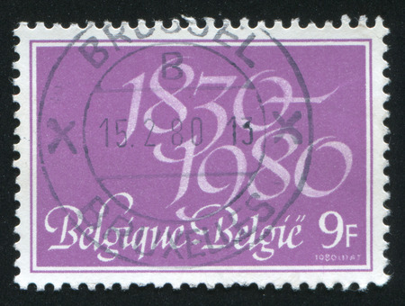 RUSSIA KALININGRAD, 20 OCTOBER 2015: stamp printed by Belgium, shows Independence emblem, circa 1980のeditorial素材