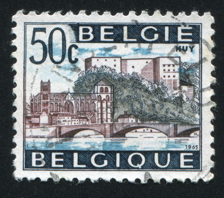 RUSSIA KALININGRAD, 20 OCTOBER 2015: stamp printed by Belgium, shows Bridge and Castle Huy, circa 1965のeditorial素材