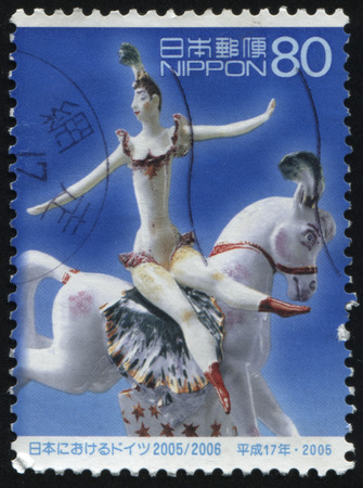 RUSSIA KALININGRAD, 18 MARCH 2016: stamp printed by Japan shows porcelain figurine, circa 2005のeditorial素材