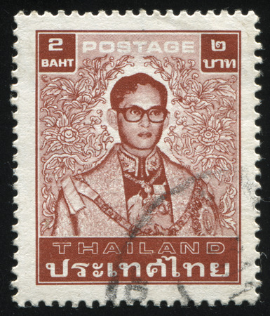 RUSSIA KALININGRAD, 3 JUNE 2016: stamp printed by Thailand shows King Bhumibol Adulyadej, circa 1980のeditorial素材