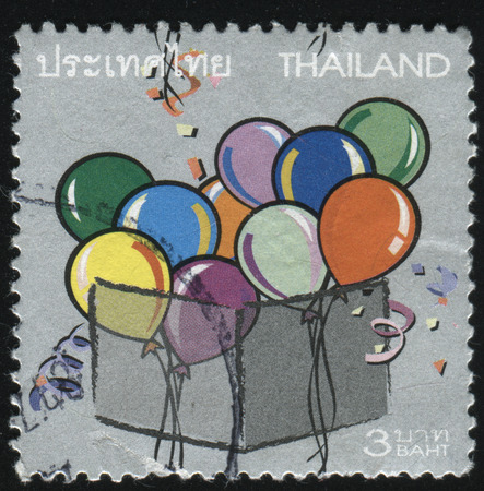 RUSSIA KALININGRAD, 3 JUNE 2016: stamp printed by Thailand, shows ballons in the box, circa 2004のeditorial素材