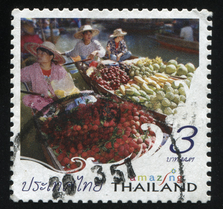 RUSSIA KALININGRAD, 3 JUNE 2016: stamp printed by Thailand, shows people, selling food, circa 2012のeditorial素材