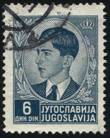 RUSSIA KALININGRAD,12 NOVEMBER 2016: stamp printed by Yugoslavia, shows the portrait of King Peter II, circa 1939のeditorial素材