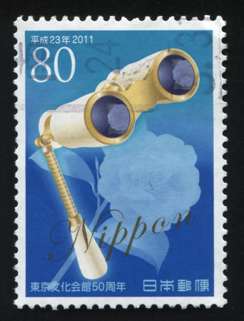 RUSSIA KALININGRAD, 22 APRIL 2016: stamp printed by Japan, shows binoculars, circa 2011のeditorial素材
