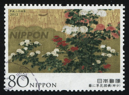 RUSSIA KALININGRAD, 18 MARCH 2016: stamp printed by Japan, shows bush with flowers in front of mountaines, circa 2012のeditorial素材